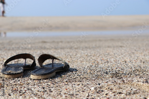 flip flops on the beach