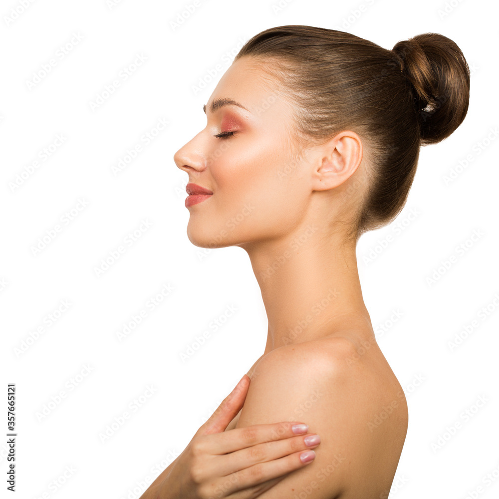 Portrait of a young woman. Bare shoulders. Hand touches face Portrait of a young woman. Bare shoulders. Hand touches face