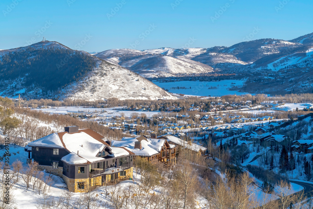 Picturesque Park City Utah winter landscape with snowy homes and frosted hills