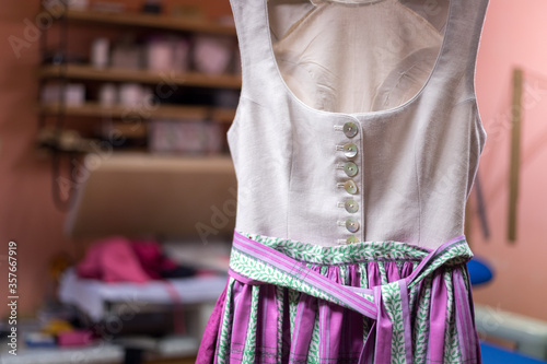 Close up of a traditional dirndl dress. Dressmaker’s workshop