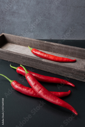 Red chili pepper on table