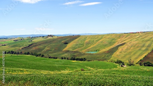 natural landscape of the Crete Senesi near Asciano in the Tuscan countryside in Siena, Italy. The Crete Senesi are typical terrain features characterized by gullies, cliffs and biancane.