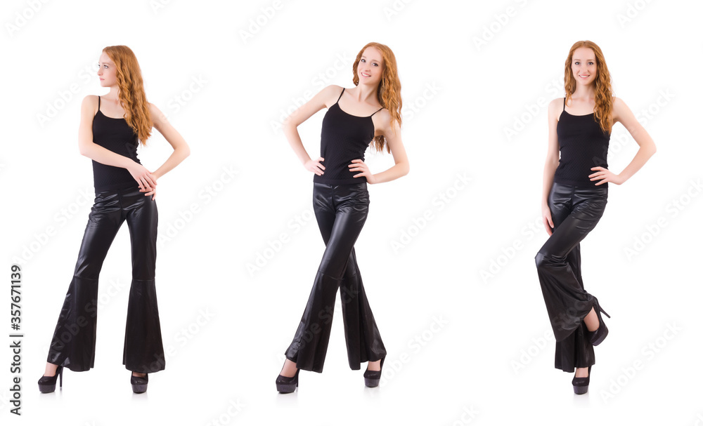 Redhead woman in black bell bottom pants on white Redhead woman in black bell bottom pants on white