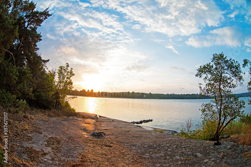 Evening landscape  sunset  the shore of the island in the Baltic Sea Bay 