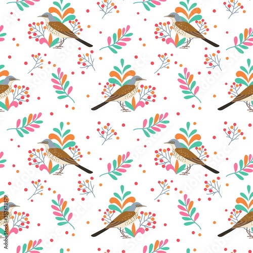 Regular seamless pattern with thrush birds and branches with berries
