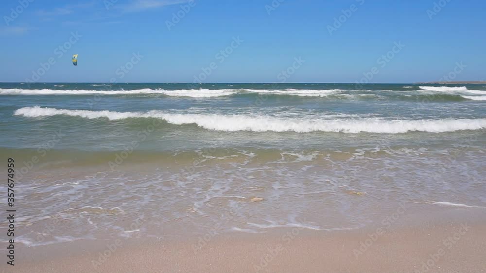 Paradise beach with beautiful sea waves on a sandy beach on a Sunny day. Paradise beach with beautiful sea waves on a sandy beach on a Sunny day.