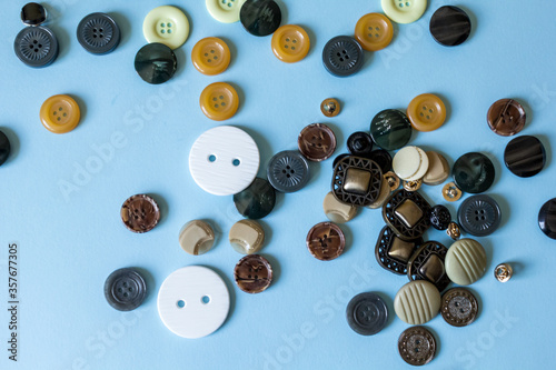 an abundance of buttons on a blue background.