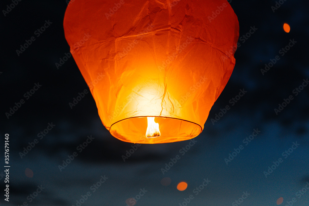 In the evening, at sunset, people with their relatives and friends launch traditional lanterns. Tradition and travel