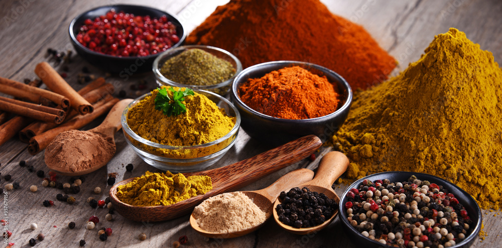 Fototapeta premium Variety of spices on kitchen table