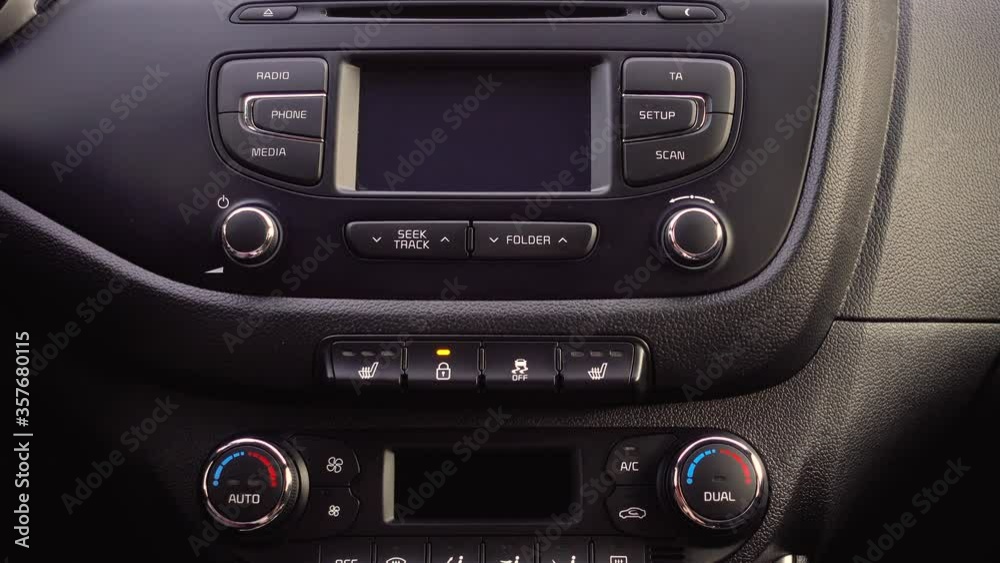 Man hand pressing the button to lock the car. Open door cars. Man hand pressing the button to lock the car. Open door cars.