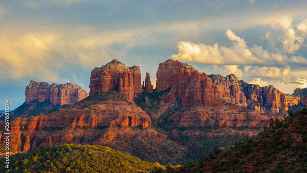 Cathedral Rock in Sedona, Arizona with a little sunlight in the clouds. 