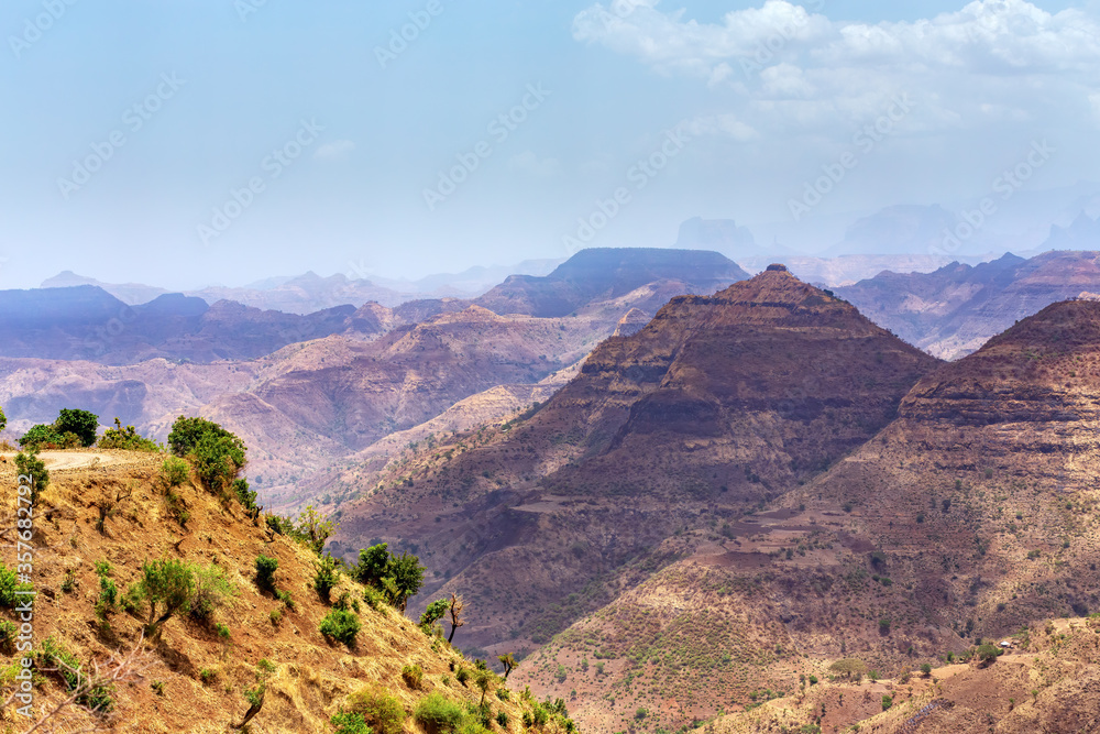 View of beautiful Semien or Simien Mountains National Park landscape in Northern Ethiopia. Africa wilderness, Sunny day and blue sky