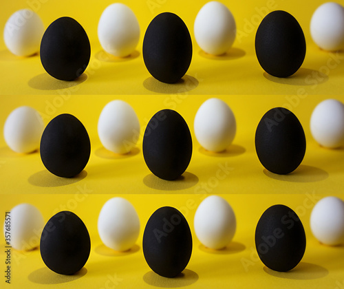 Black and white eggs on the yellow background. Black lives matter, all lives matter, diversity, equal rights concept