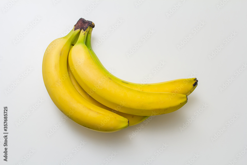 bunch of bananas on a white background, top view bunch of bananas on a white background, top view