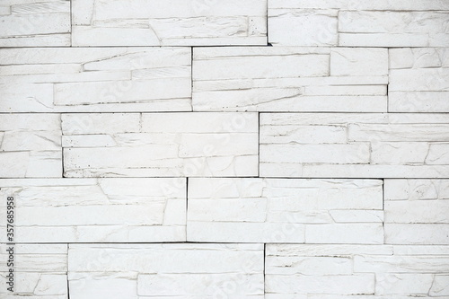 decorative white brick wall, plaster light background, building wall