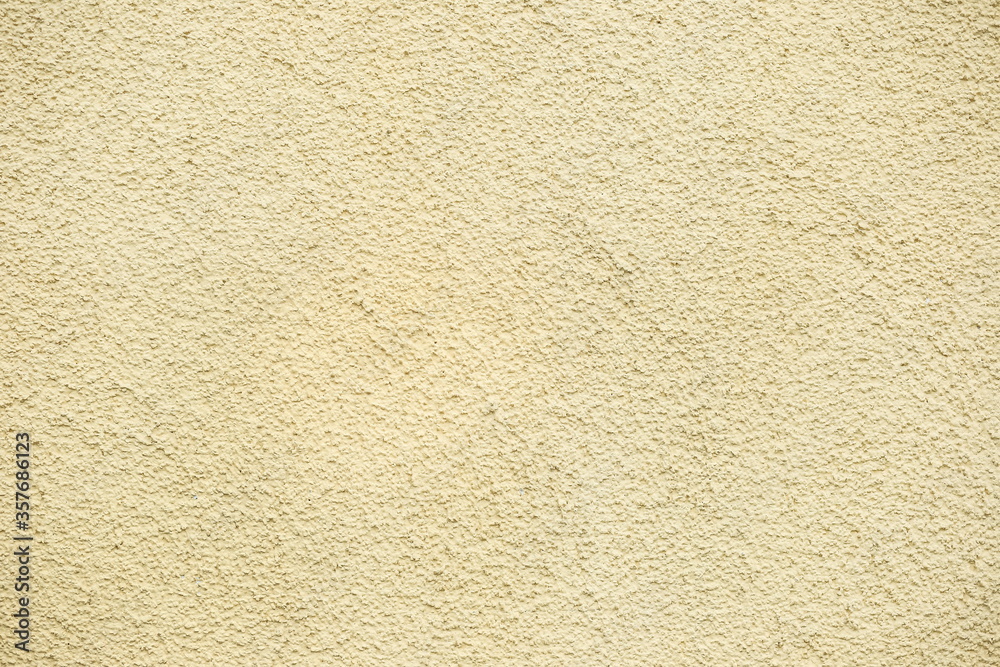 yellow decorative concrete wall, plaster light background, building wall yellow decorative concrete wall, plaster light background, building wall