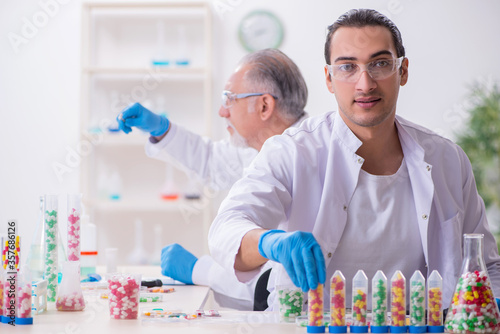 Two chemists working in the lab