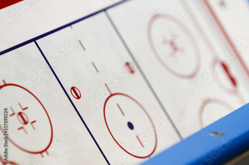 Canvas Print Closeup of a flipchart with ice hockey rink markings on it.