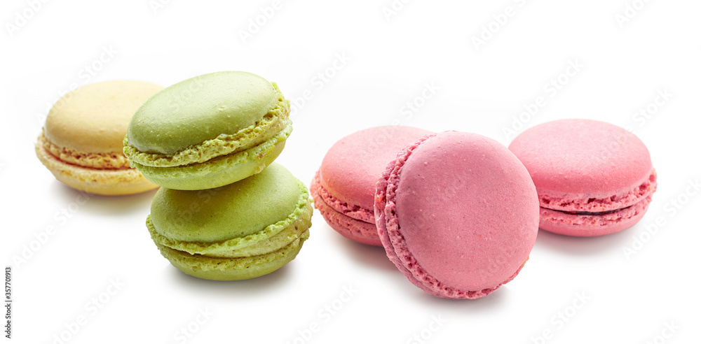 various macaroons on white background