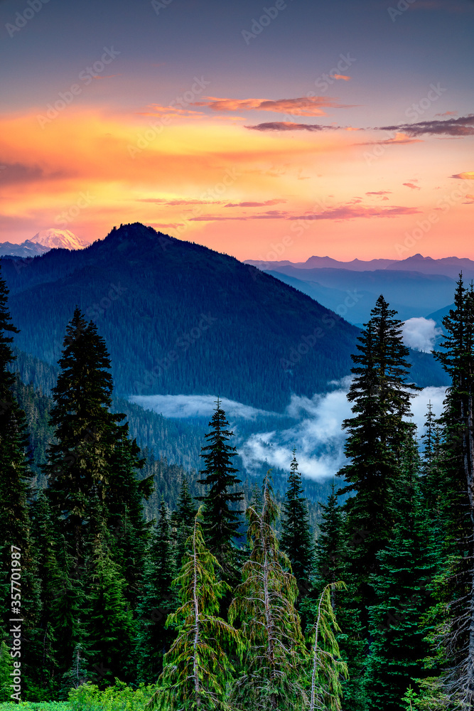 Sunset at  beautiful mount rainier national park in Washington with awesome clouds
