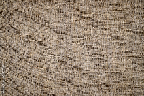 Ancient grey linen cloth, close up macro. Pure linen texture. Old hemp burlap fabric, closeup