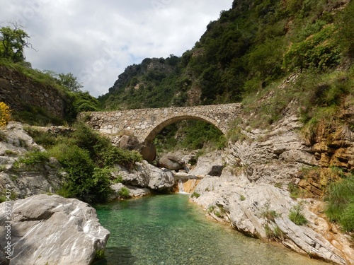 Stone bridge in mountains in the Nervia Valley