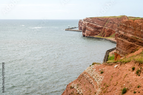 High angle view of the rock on Heligoland island against blue sea and clear sky