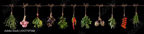 panorama of fresh vegetables and spices on wooden background