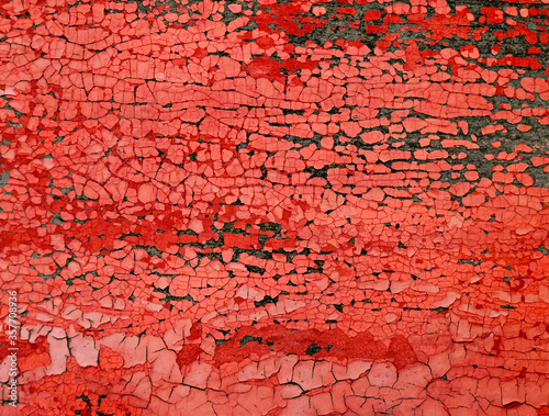 Cracked and peeling red oxidized paint on wood with texture and grunge finish  © CaptureAndCompose