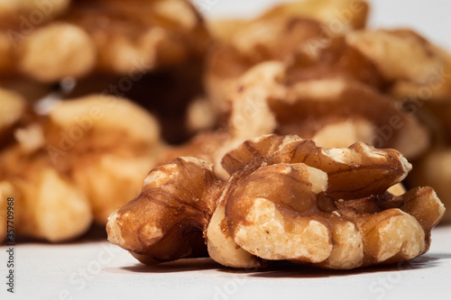 Macro of a walnut in front of others