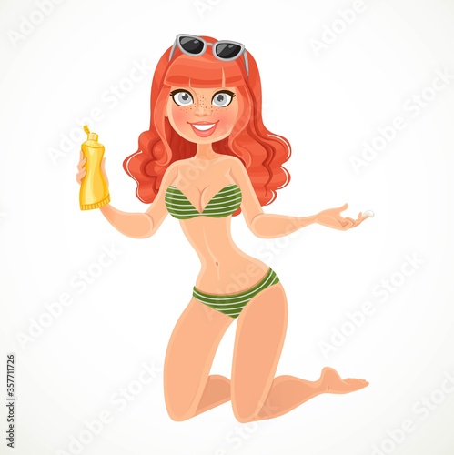 Cute redhaired girl in green swimsuit holds a sunblock in hand isolated on white background