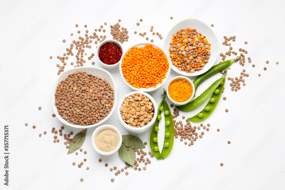 Bowls with lentils and spices on white background Bowls with lentils and spices on white background