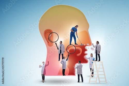 Photos Otolaryngology concept with doctors treating patient