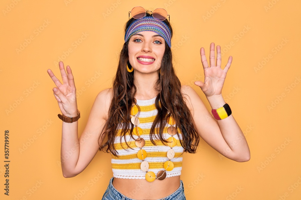Young beautiful hippie woman with blue eyes wearing accesories and sunnglasses showing and pointing up with fingers number eight while smiling confident and happy. Young beautiful hippie woman with blue eyes wearing accesories and sunnglasses showing and pointing up with fingers number eight while smiling confident and happy.