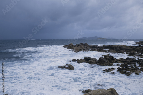 Sea storm, waves breaking on a stone coast, bad weather, Atlantic Ocean, beautiful landscape