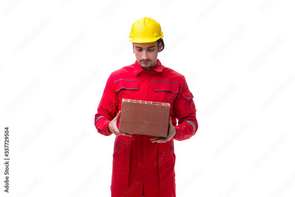 Young male mason with brick isolated on white Young male mason with brick isolated on white