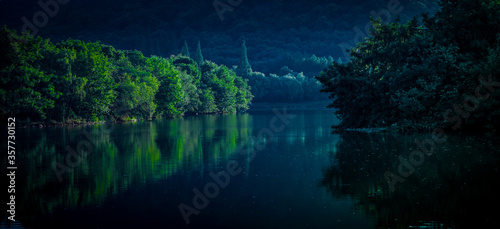 In the calm mirror like lake of nature