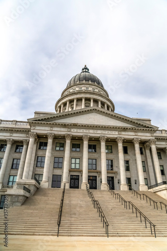 Utah State Capital building dome and stairs leading to the pedimented entrance