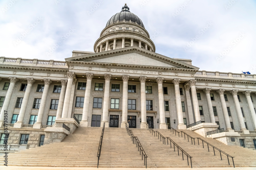Utah State Capital building with stairs leading to the pedimented entrance