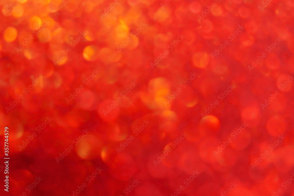 Wallpaper phone shining glitter.Red shiny blurred background. Soft focus.Shining red bokeh surface.Glitter shiny texture.Abstract flickering festive background. Wallpaper phone shining glitter.Red shiny blurred background. Soft focus.Shining red bokeh surface.Glitter shiny texture.Abstract flickering festive background.