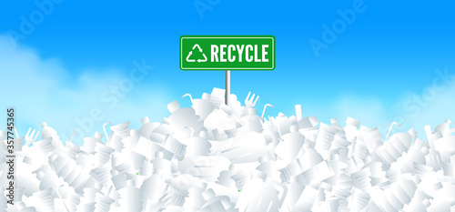 recycle sign on plastic waste pile ecology concept
