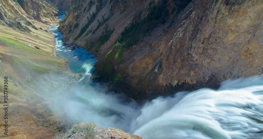 Lockdown time lapse shot of Upper Falls amidst rock formation at national park - Yellowstone National Park, Wyoming
