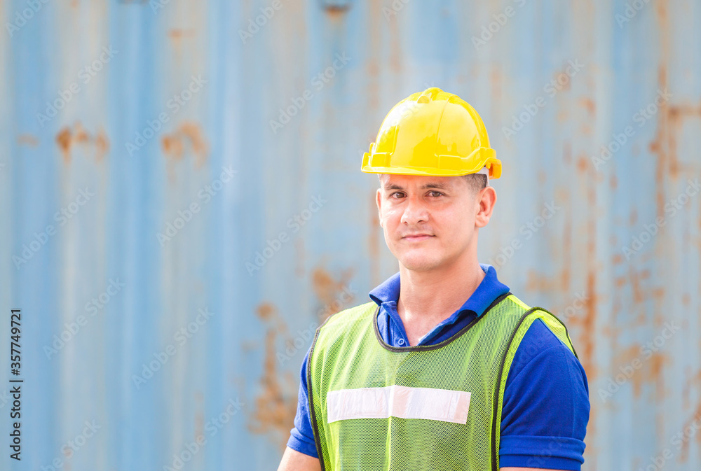 Cheerful engineer man in hard hat smiling and looking at camera, Happiness concept Cheerful engineer man in hard hat smiling and looking at camera, Happiness concept