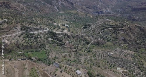 Sierra Nevada (Spain) mountain range & orchards with drone shot in 4k