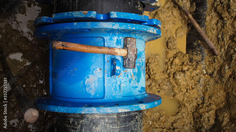 The pipe connection is installed on the leaking main pipe or burst pipe Stock Photo Adobe Stock