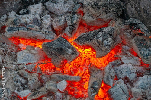 ed-hot coals of a fire close-up macro photo