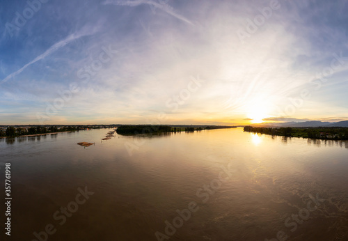 Fraser River View during a colorful sunset. Aerial View taken from Golden Ears Bridge, in Pitt Meadows, Greater Vancouver, British Columbia, Canada.