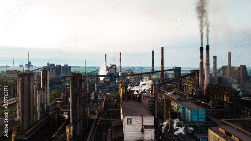 Industry metallurgical plant smoke from pipes mining ecology pollution.