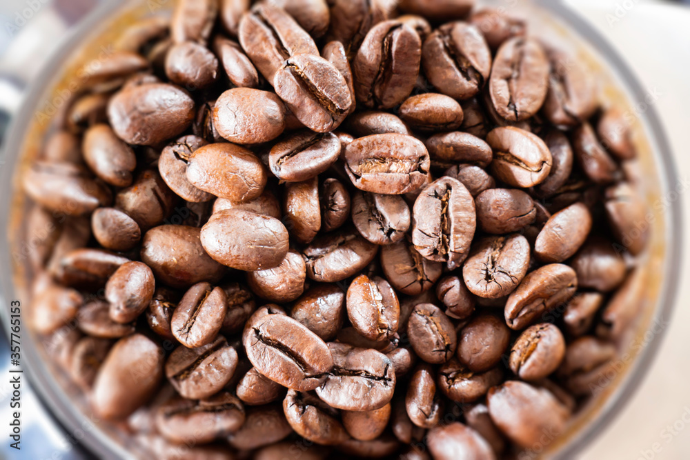 Fototapeta premium Fresh roasted blend coffee beans, stock photo