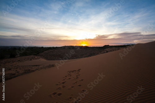 Sunset at Sand dunes in the desert, Muine, Vietnam